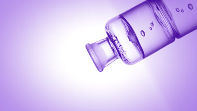 Salicylic acid drips into old fashioned bottle with liquid