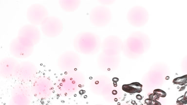 Tiny grey bubbles of hyaluronic acid are moving spontaneously