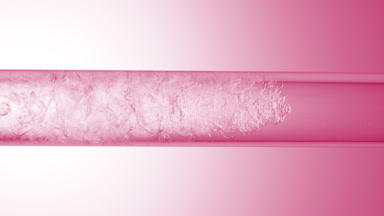 Glycerin is pouring in glass tube with transparent fluid