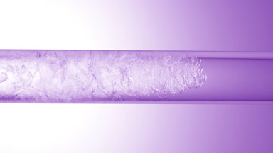 Glycerin is pouring in glass tube with transparent fluid