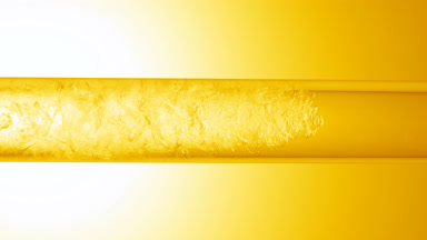 Glycerin is pouring in glass tube with transparent fluid