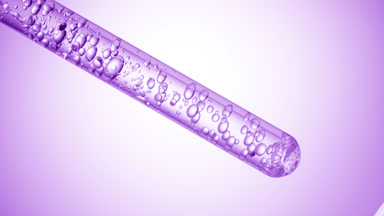 Salicylic acid is injected in test tube creating bubbles
