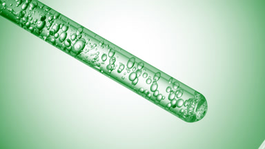 Citric acid is injected in test tube creating bubbles