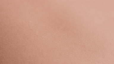 Extreme close-up shot of good-looking healthy pure moving skin