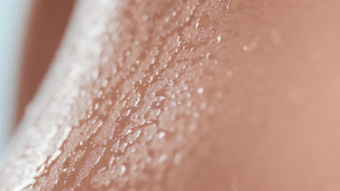 Extreme close-up shot of healthy pure clean wet moving skin
