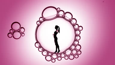 Woman's silhouette inside macro bubble on pink background