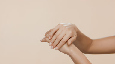 Close-up shot of female hands are rubbed and interlocked