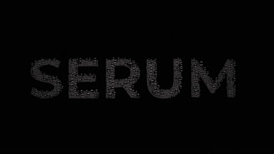 Serum word blown off the wet glass on black background