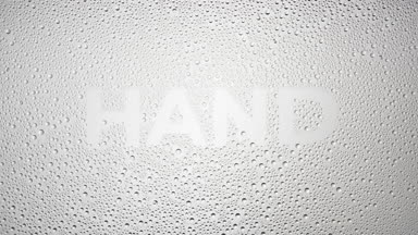 Hand inscription blown off the wet glass on grey background