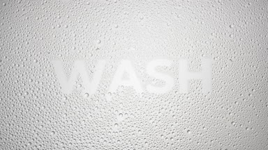 Wash inscription blown off the wet glass on grey background