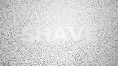 Shave word blown off the wet glass on grey background