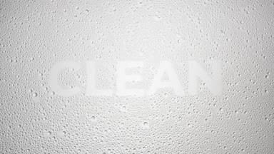 Clean word blown off the wet glass on grey background