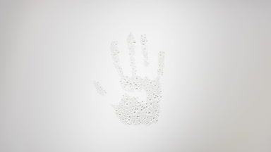 Inverted handprint blown off the wet glass on grey background