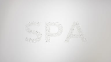 Spa inscription blown off the wet glass on grey background
