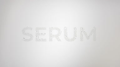 Serum inscription blown off the wet glass on grey background