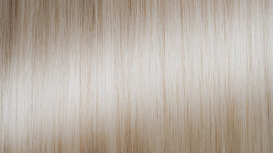 A wave passes through blonde hair