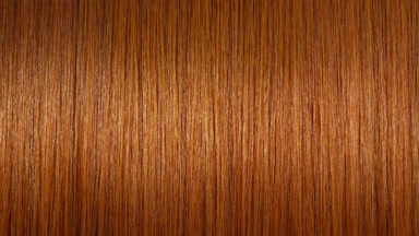 A wave passes through ginger hair