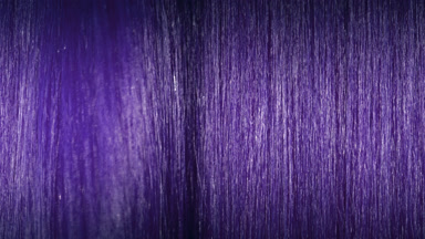 A wave passes through violet hair