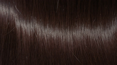 Shaking brunette hair making slow motion waves