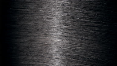 Light reflection passes through straight black hair