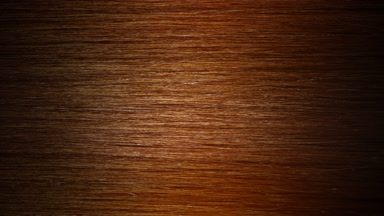 A wave passes through red hair