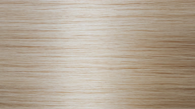 A stick running under blonde hair surface making wave