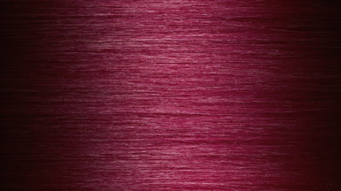 A wave passes through pink hair