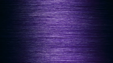 A stick running under purple hair surface making wave