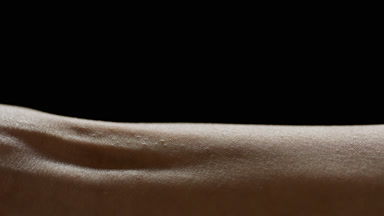 Good-looking skin of young African American female model moving