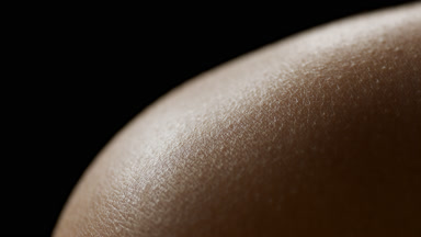 Macro shot of good-looking skin of African American woman
