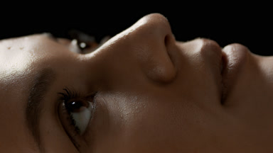 Young good-looking African American female model opens her eyes