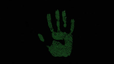 Green inverted handprint blown off the wet glass on black bg
