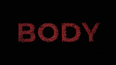 Red body word blown off the wet glass on black background