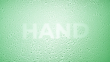 Hand inscription blown off the wet glass on green background