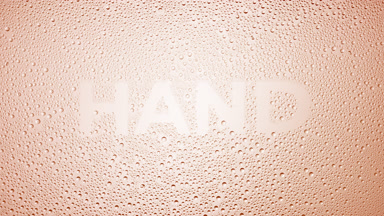 Hand inscription blown off the wet glass on beige background