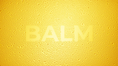 Balm writing blown off the wet glass on yellow background