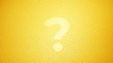 Question mark blown off the wet glass on yellow background