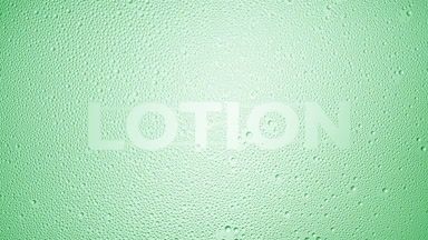 Lotion word blown off the wet glass on green background