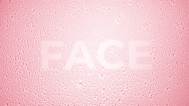Face text blown off the wet glass on pink background