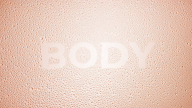 Body text blown off the wet glass on beige background