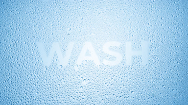 Wash inscription blown off the wet glass on blue background