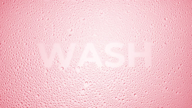 Wash inscription blown off the wet glass on pink background