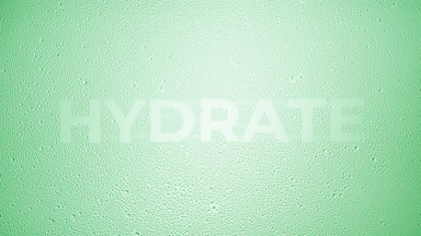 Hydrate writing blown off the wet glass on green background