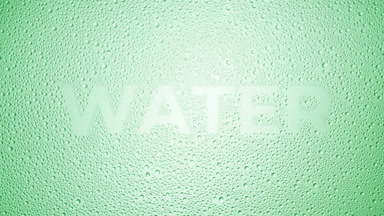 Water word blown off the wet glass on green background