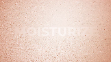 Moisturize text blown off the wet glass on beige background
