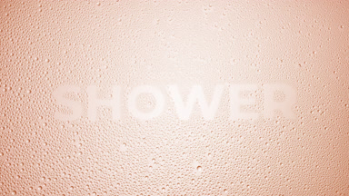 Shower word blown off the wet glass on beige background