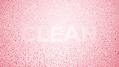 Clean word blown off the wet glass on pink background