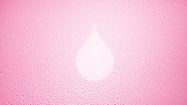 Drop shape print blown off the wet glass on pink background