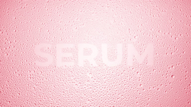 Serum word blown off the wet glass on pink background
