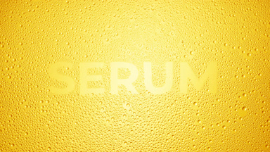Serum word blown off the wet glass on yellow background
